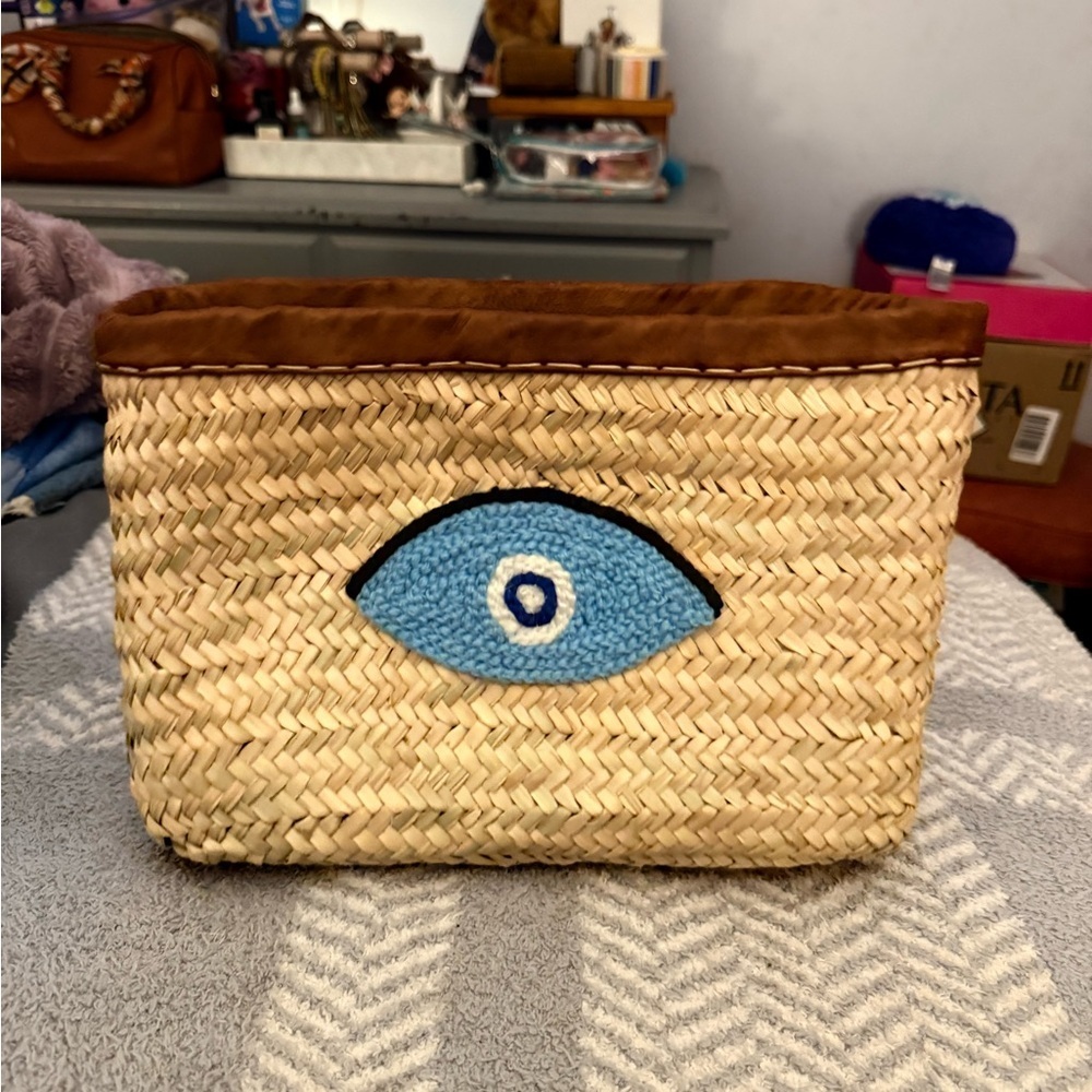 Woven Straw Clutch with Blue Evil Eye Design